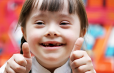 Smiling girl with downs syndrome 