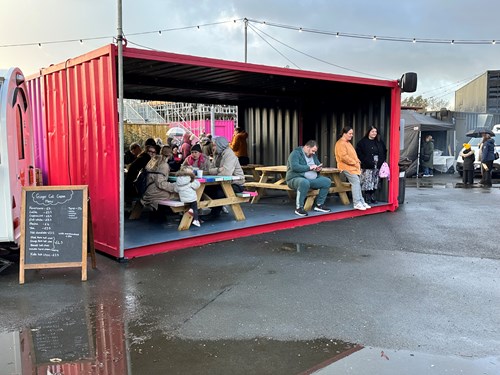 A shipping container that has been turned into seating space at Salt and Tar.
