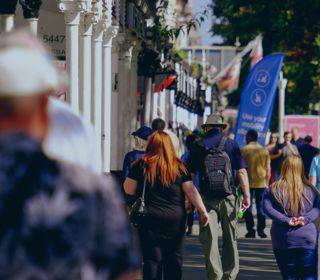 a photo of lord street with people walking down it