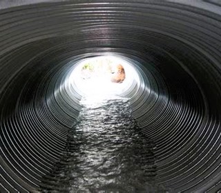 Water flowing through a drainage pipe