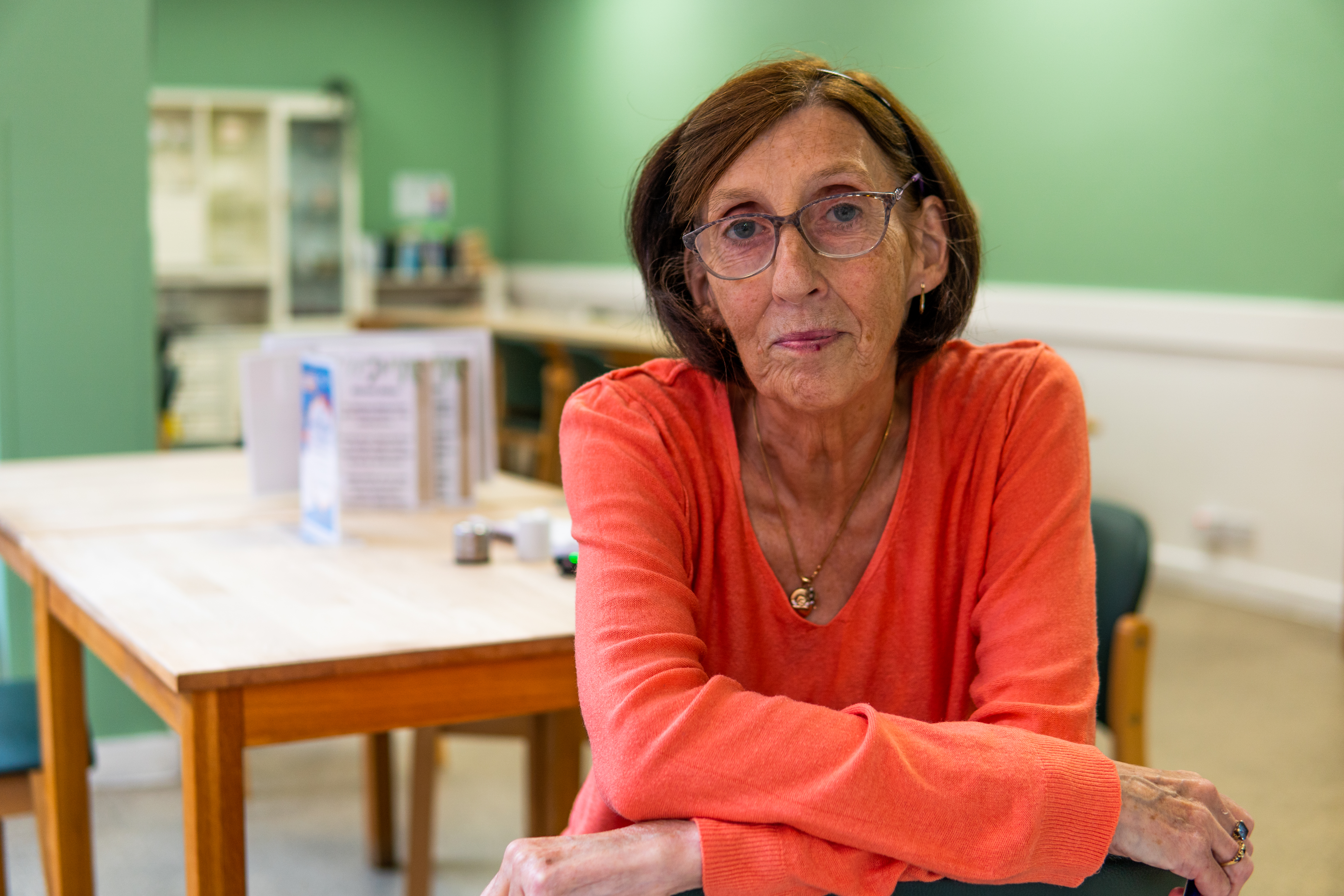 Woman looking at camera at a Carers Centre